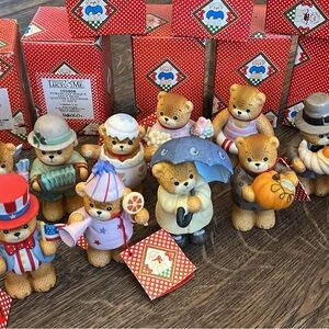12 monthly bears. All in boxes. Displayed only. Lucy & Me